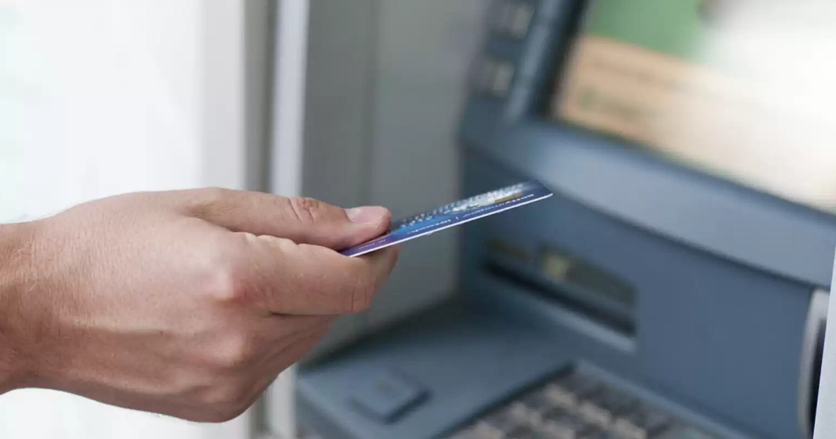 hand-inserting-ATM-card-into-bank-machine