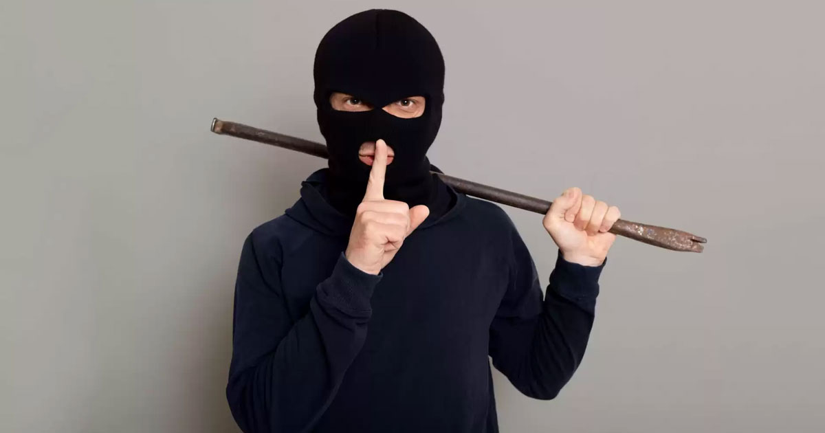 young-robber-dressed-black-hoodie-with-masked-face
