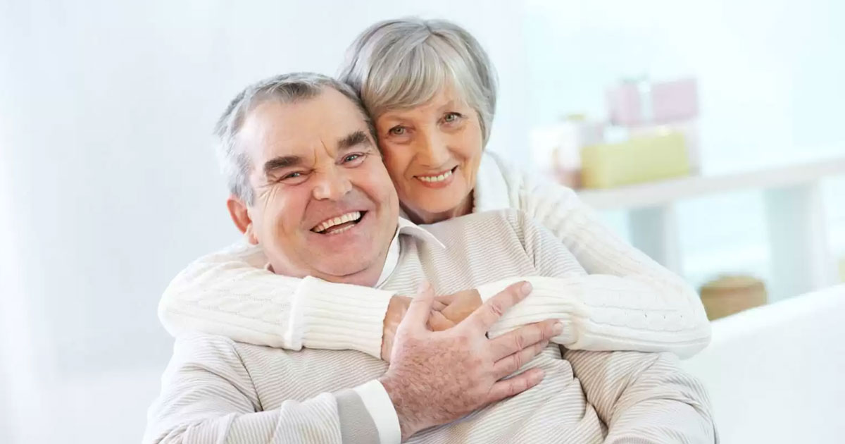 smiling-elders-hug